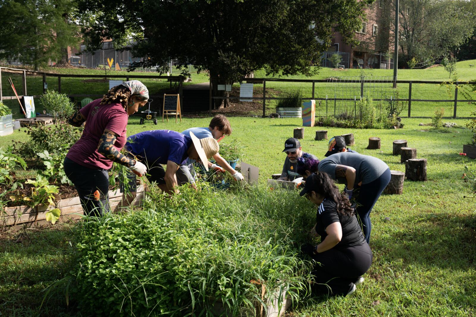 Westside parents and students working side by side in the school garden